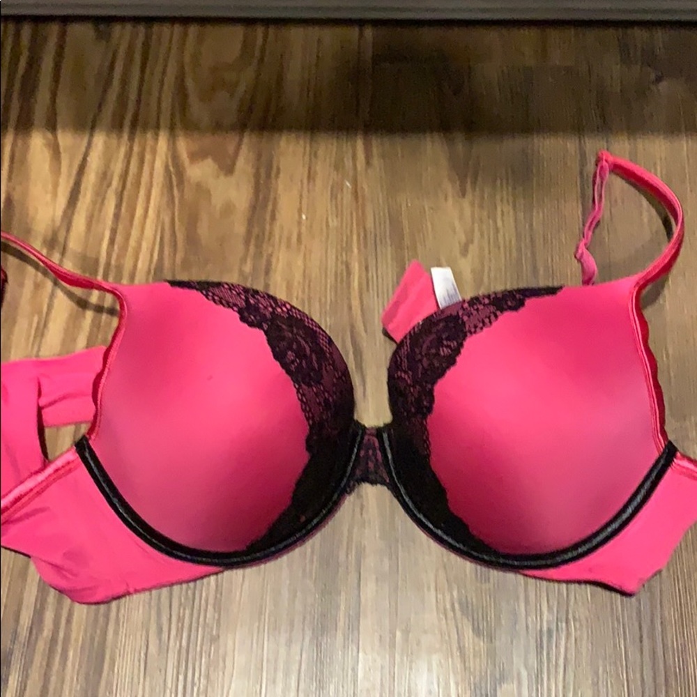 Pink and black lace bra